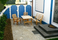 Große Ferienwohnung in Haffkrug bei Scharbeutz; direkte Strandlage mit Meerblick. Foto der Terrasse.